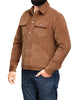 Model wearing the cord shirt jacket for men by Luxire in light brown one hand in pocket