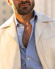 Close up of model outside wearing the linen shirt jacket for men by Luxire in cream